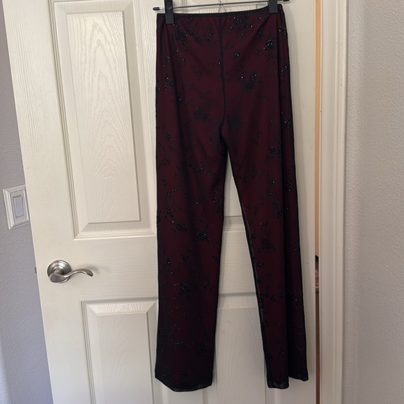 Women’s black sparkly stretchy pants with red back lining - Picture 3 of 4